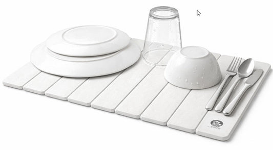 Stone dish drying mat with dishes and cutlery